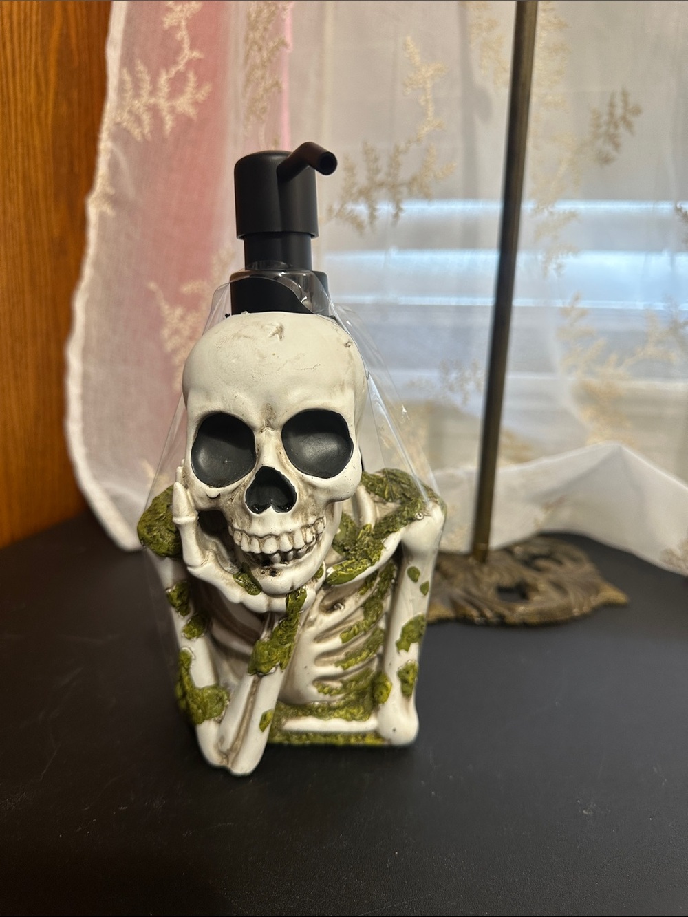 Halloween skeleton bust with moss soap dispenser — lights up!